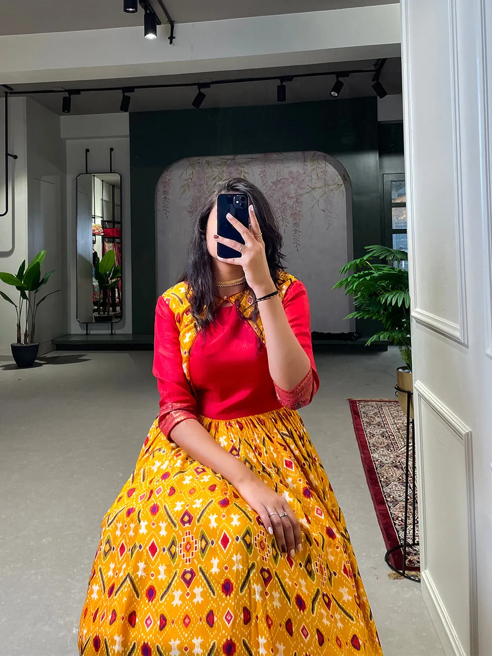 Yellow Color Patola Printed And Foil Printed Dola Silk Gown